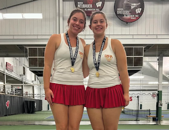 Lizze Stuckslager (left) and Amelia Stuckslager (right) after winning the doubles state title
